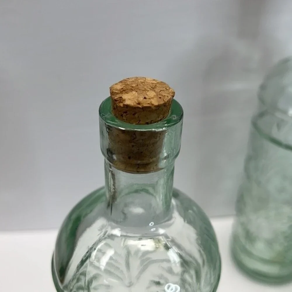 William Sonoma made in Spain Embossed Clear Green Glass Bottles set of 3